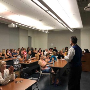 a group of people standing in a room