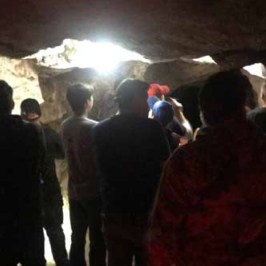 a group of people standing in a room