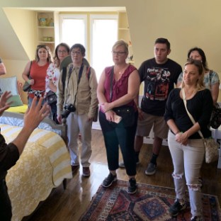 a group of people standing in a room
