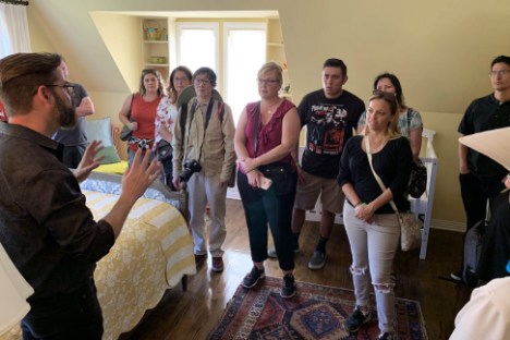 a group of people standing in a room