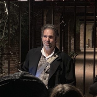 a person wearing a suit and tie