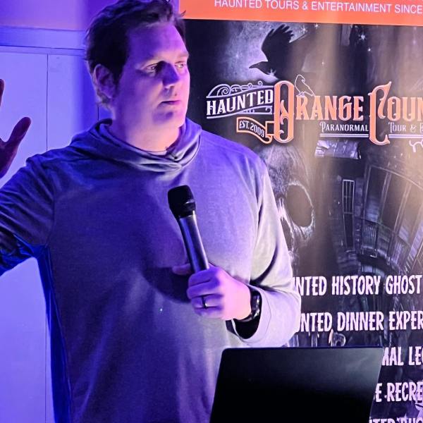 a man standing in front of a stage