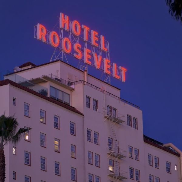 a sign in front of a building