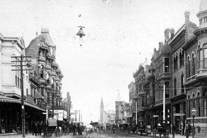 a vintage photo of a busy city street